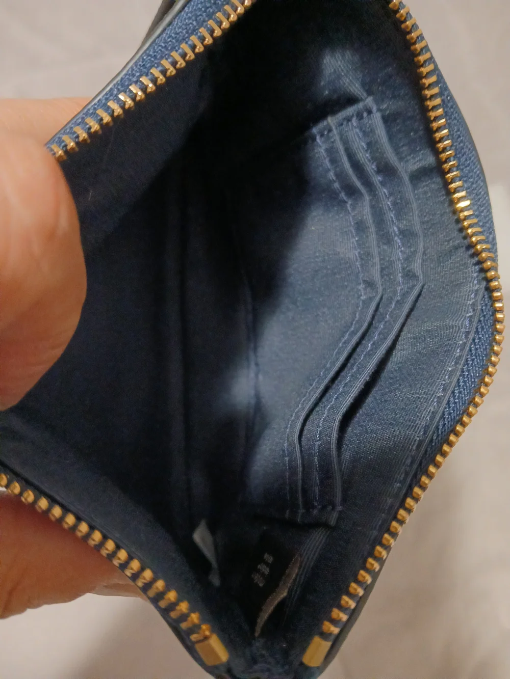 Coach Navy Pebbled Leather Zip Wristlet with Gold Hardware